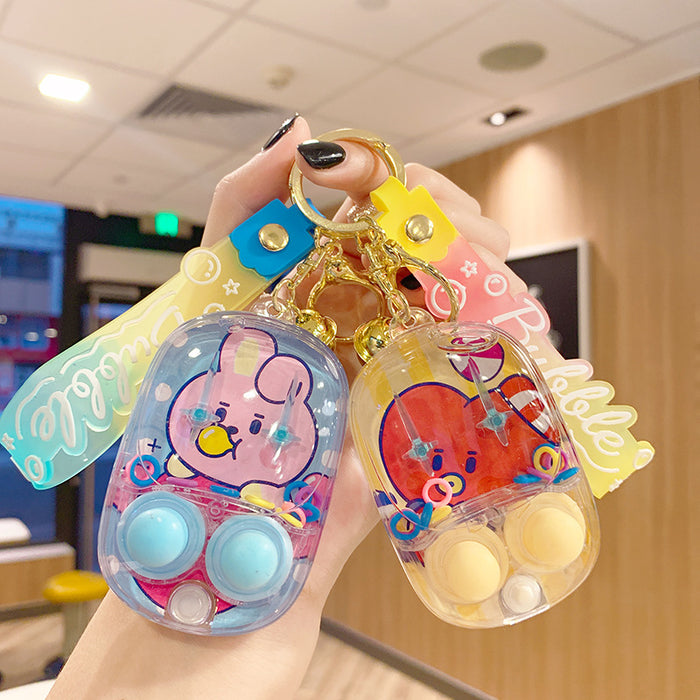 Wholesale water ring game machine key chain hanging decoration decompression toy gift keychain small pendant doll