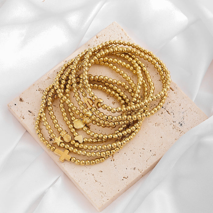 Wholesale Fashionable and minimalist bead string personalized cross flower gold bean bracelet