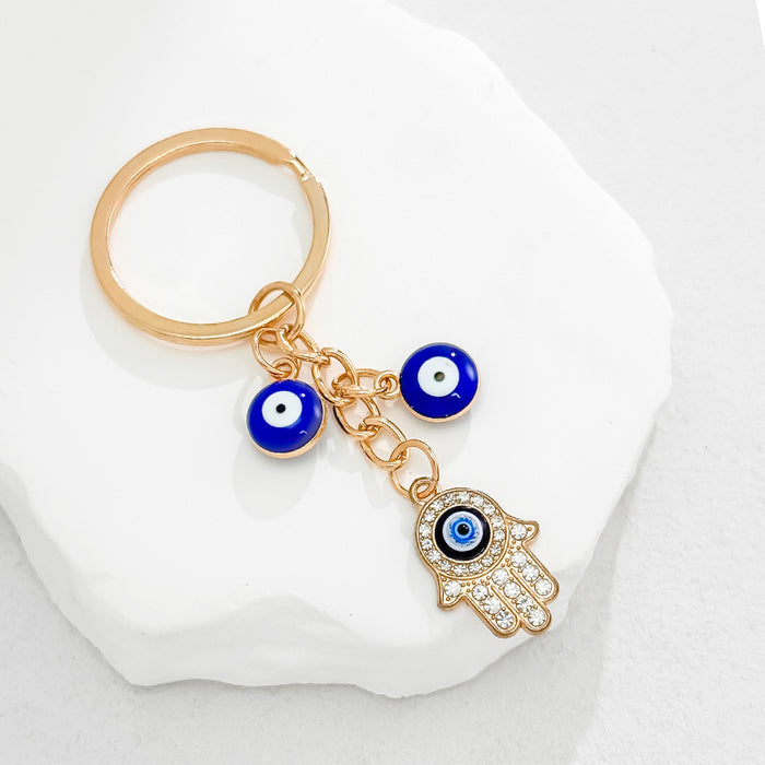 Wholesale Heart-Shaped Palm Water Drop Devil's Eye Pendant Keychain