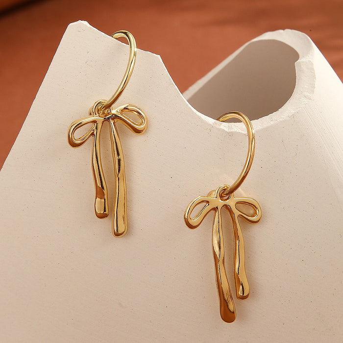 Wholesale Fashionable personalized metal bow earrings with a minimalist design and gold high sensitivity earrings