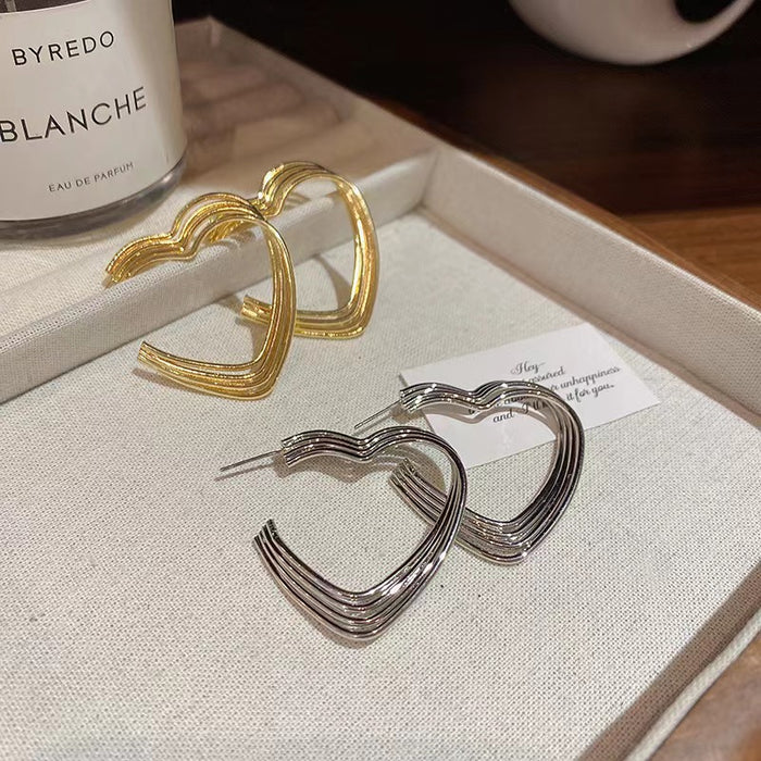 Wholesale Geometric heart-shaped exaggerated personality fashion woven earrings wholesale