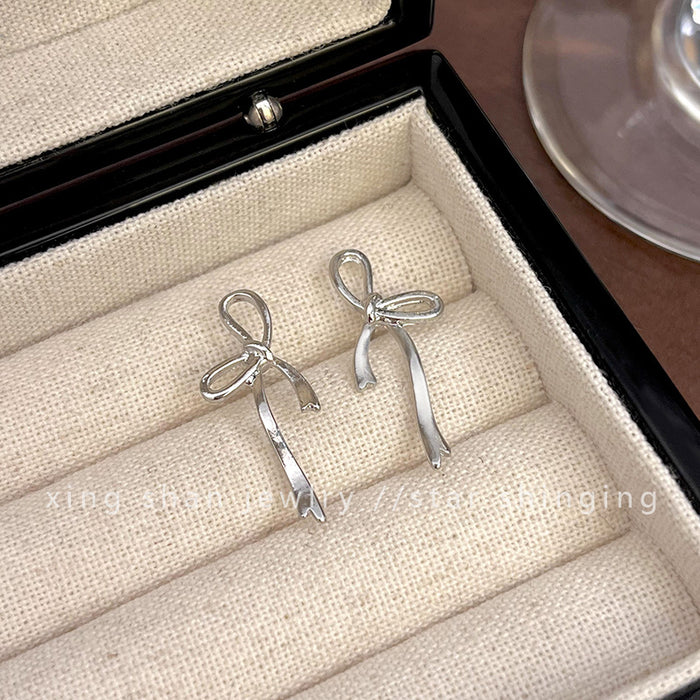 Wholesale Simple bow earrings girl fashion Joker cold wind earrings