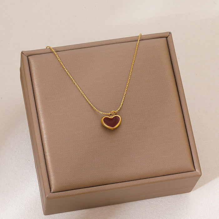 Wholesale Stainless Steel Clavicle Chain Necklace — Asymmetrical Design featuring a Bowknot  Rhinestone Accents  and Heart Pendant