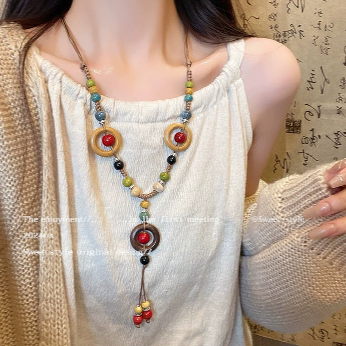 Wholesale Vintage feather necklace, double-layer layered long sweater chain accessory