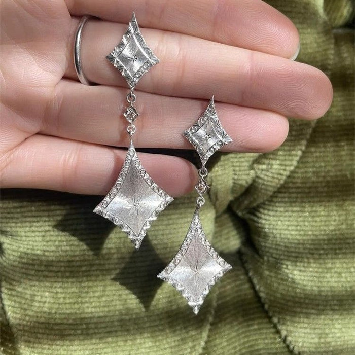 Wholesale Cool Sense Silver brushed Diamond Earrings Simple High-end Sense Italian Carved Gold Long Earrings Women' s Earrings