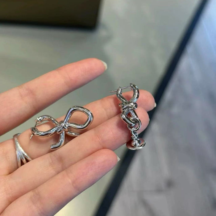 Wholesale Women' s Planet Bow Earrings