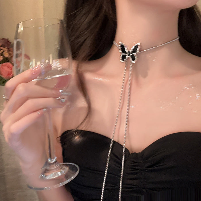 Wholesale Titanium steel black butterfly sweater chain long drawstring high-end necklace light luxury versatile collarbone chain neck chain