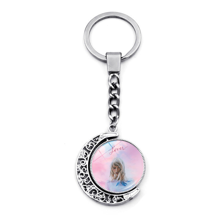 Wholesale Crystal Glass Rotating Moon Pendant Keychains JDC-KC-HengX021