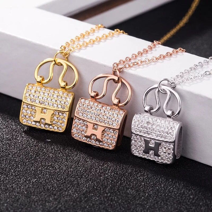 Wholesale Titanium Steel H Letter Full Diamond Bag Necklace JDC-NE-NaY001