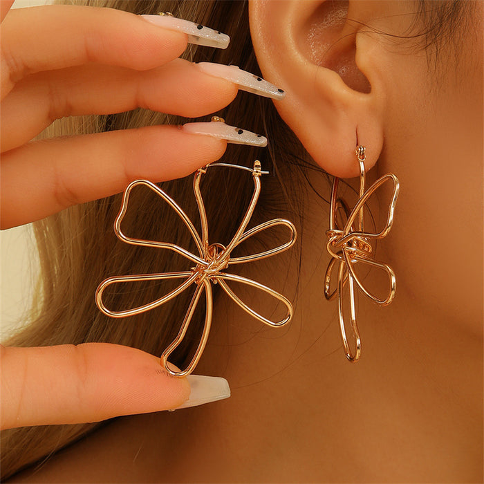 Wholesale metal line winding hollow flower earrings exaggerated personality design sense earrings