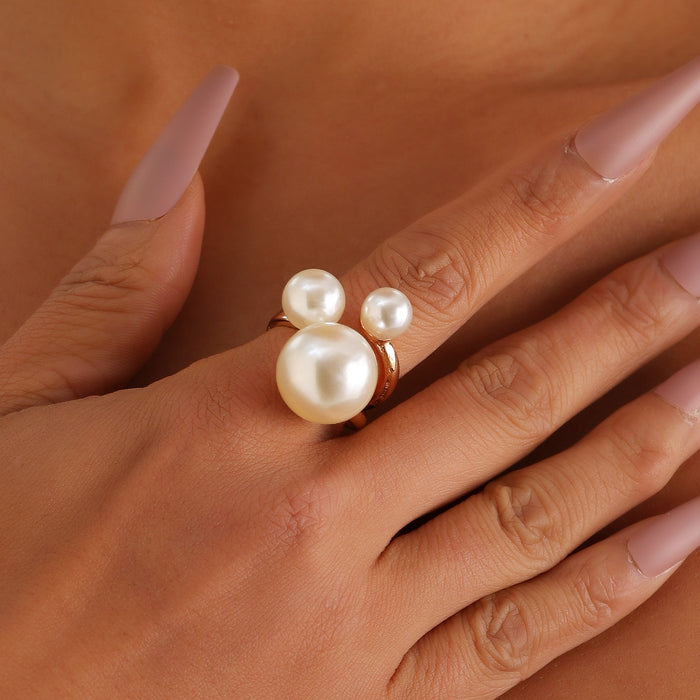 Wholesale Three faux pearl rings with metal bases