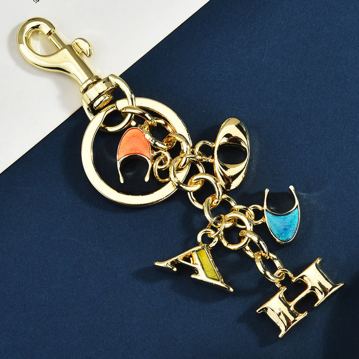 Wholesale Stylish Metal Bag Charm Keychain With Fruit Pattern And Alphabet Pendant For Car Keys And Bags