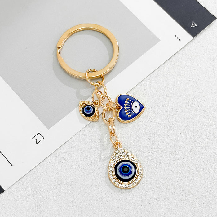 Wholesale Heart-Shaped Palm Water Drop Devil's Eye Pendant Keychain