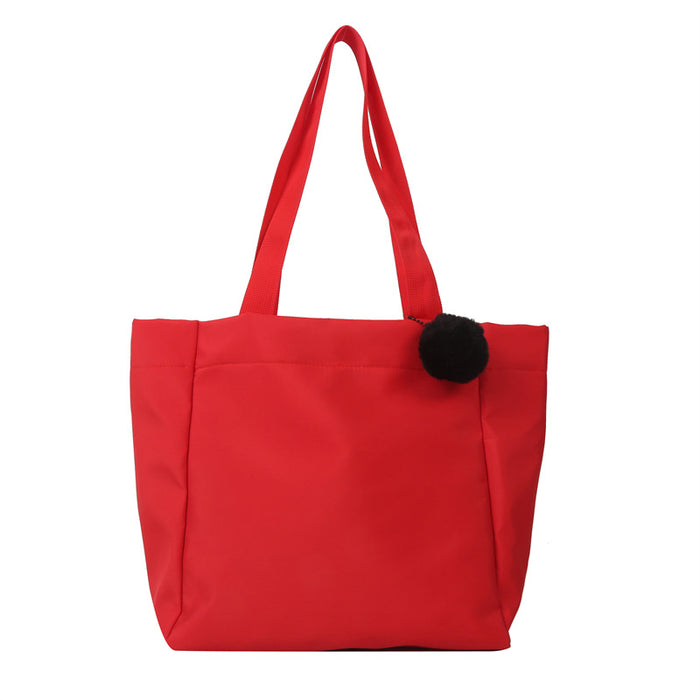 Wholesale Solid color large capacity canvas shoulder bag, simple commuting tote bag, shopping bag