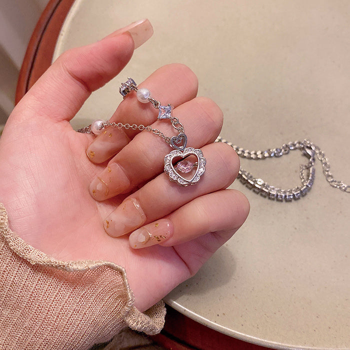 Wholesale Light luxury pearl heart-shaped zircon titanium steel necklace, versatile and high-end, collarbone chain splicing necklace