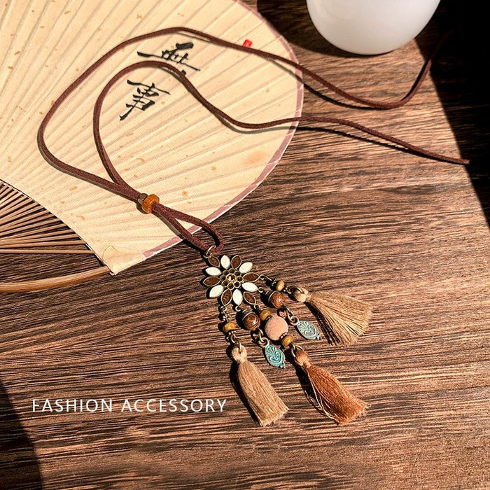 Wholesale Vintage feather necklace, double-layer layered long sweater chain accessory
