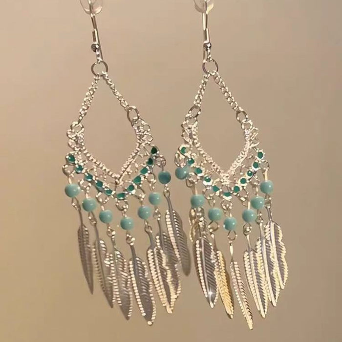 Wholesale Feather long tassel earrings with retro and niche design, fashionable and exquisite ear hooks