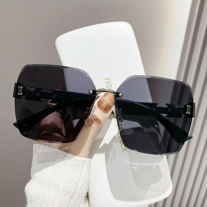 Wholesale Advanced frameless sunglasses, fashionable outdoor UV protection, driving sunshade