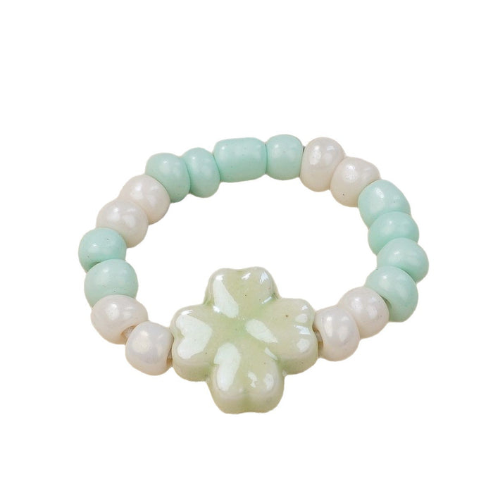 Wholesale New Ceramic Flower Ring Wholesale Student Versatile Handpiece