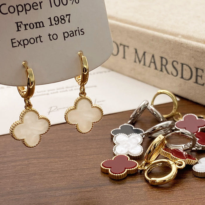 Wholesale Simple lucky flower gold plated earrings