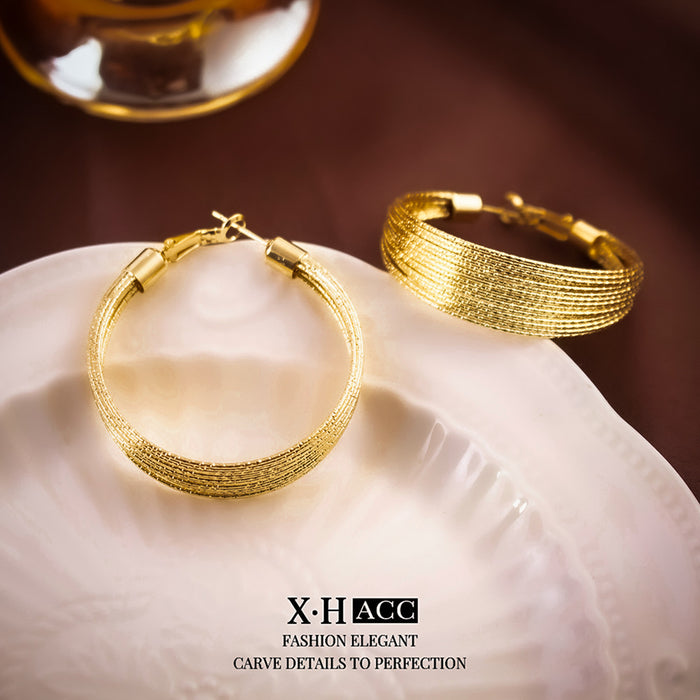 Wholesale Geometric multi-layer circle ear buckle, simple and fashionable, versatile earrings, niche design, high-end earrings