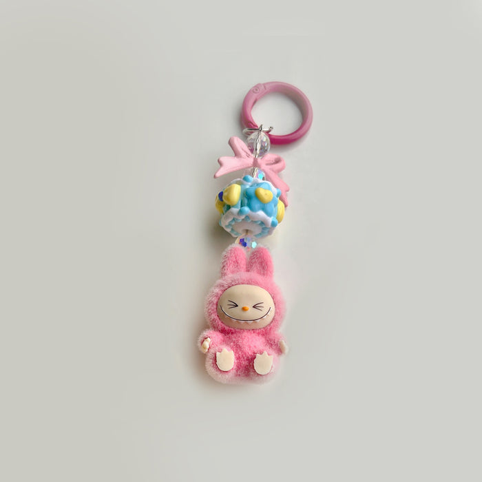 Wholesale Flocked Mini Keychain Vinyl Cute Baby Walking Bag Mobile Phone Pendant Cute Pendant