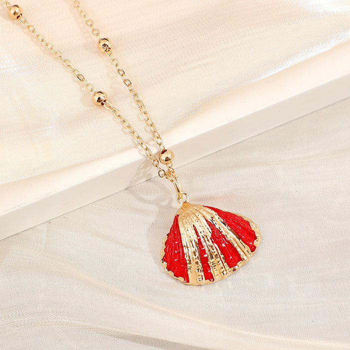 Wholesale Gold edged conch and seashell necklace