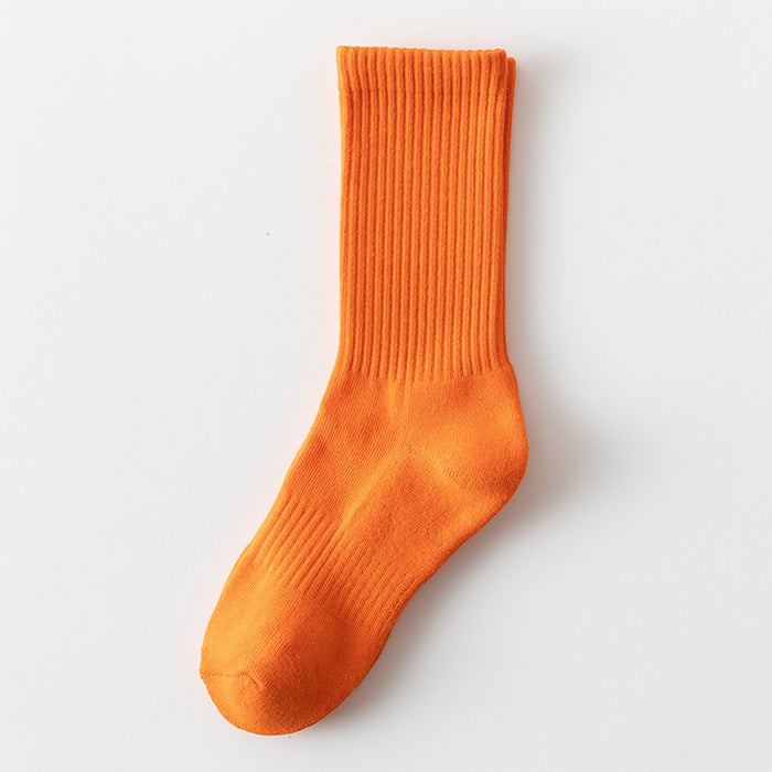 Wholesale Solid color high elastic looped socks for men and women, long socks for sports, cotton socks