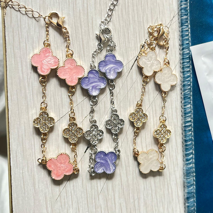 Wholesale Four leaf clover bracelet with a light luxury and high-end feel, niche design, zircon super sparkling temperament bracelet