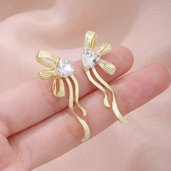 Wholesale Ribbon bow, silver needle, heart-shaped diamond studded earrings, simple and high-end, versatile earrings, fashionable and personalized earrings
