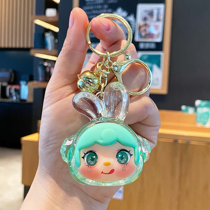 Wholesale Oil-flow sand earphone rabbit keychain