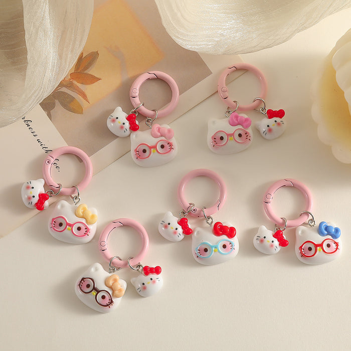Wholesale Cartoon Cat With Bow And Glasses Resin Keychain Pendant Chic Decorative Accessory