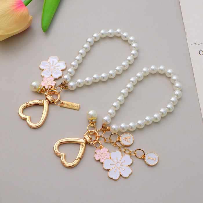 Wholesale Flower Pearl Pendant Keychain Girl Beaded Mobile Phone Chain Headset Bag Pendant