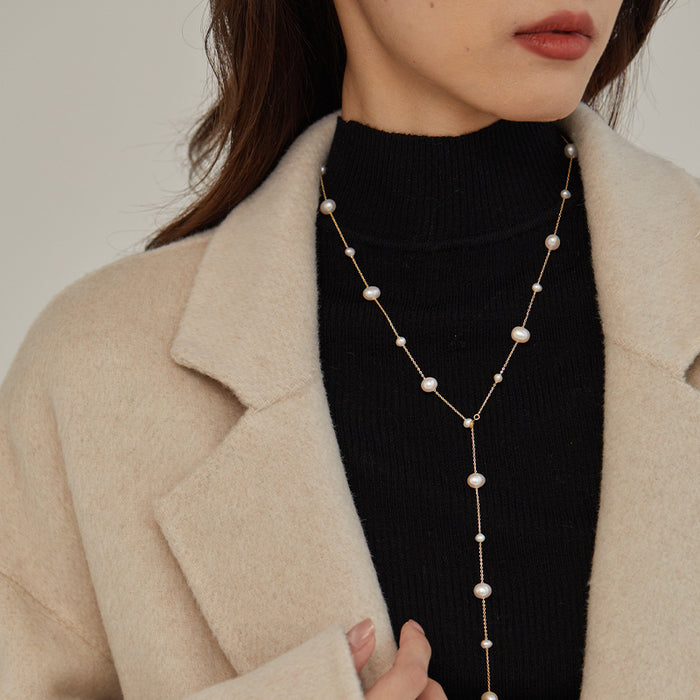 Wholesale Sweater chain pearl long versatile collarbone chain light luxury niche tassel necklace