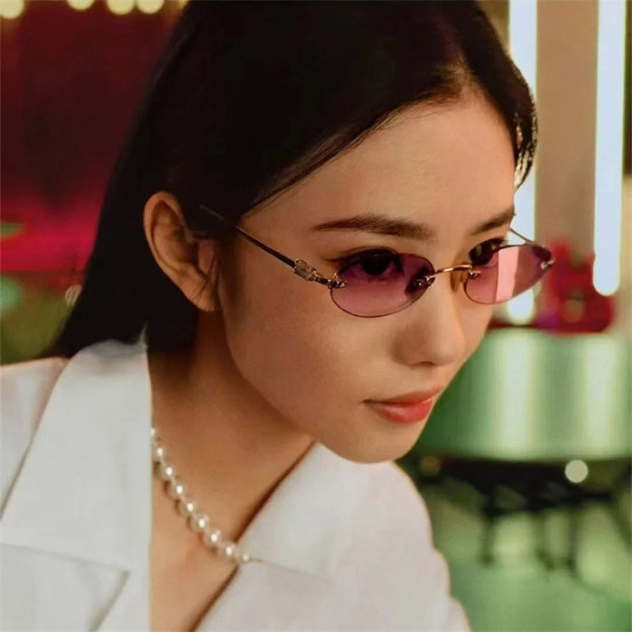 Wholesale Frameless sunglasses, high-end, fashionable, versatile, oval sunglasses