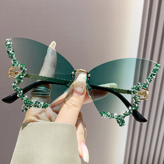 Wholesale Butterfly Shape Diamond Frameless PC Sunglasses JDC-SG-MNY001