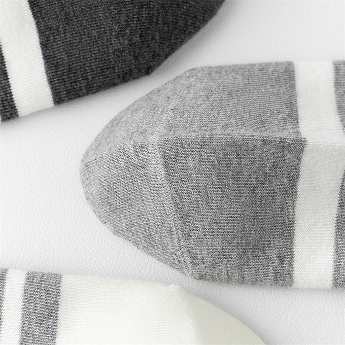 Wholesale Couple sports socks with asymmetrical stripes on the four bars