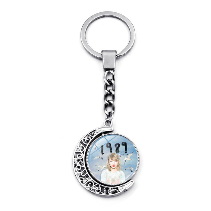 Wholesale Crystal Glass Rotating Moon Pendant Keychains JDC-KC-HengX021