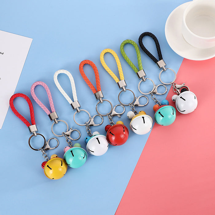 Wholesale Bag hanging decoration small gift creative woven leather rope bell keychain fashionable multi-color bell