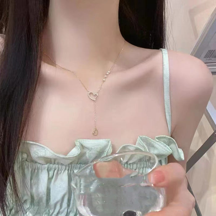 Wholesale Titanium steel necklace, heart-shaped pendant, high-end feel, light luxury, pearl splicing, collarbone chain