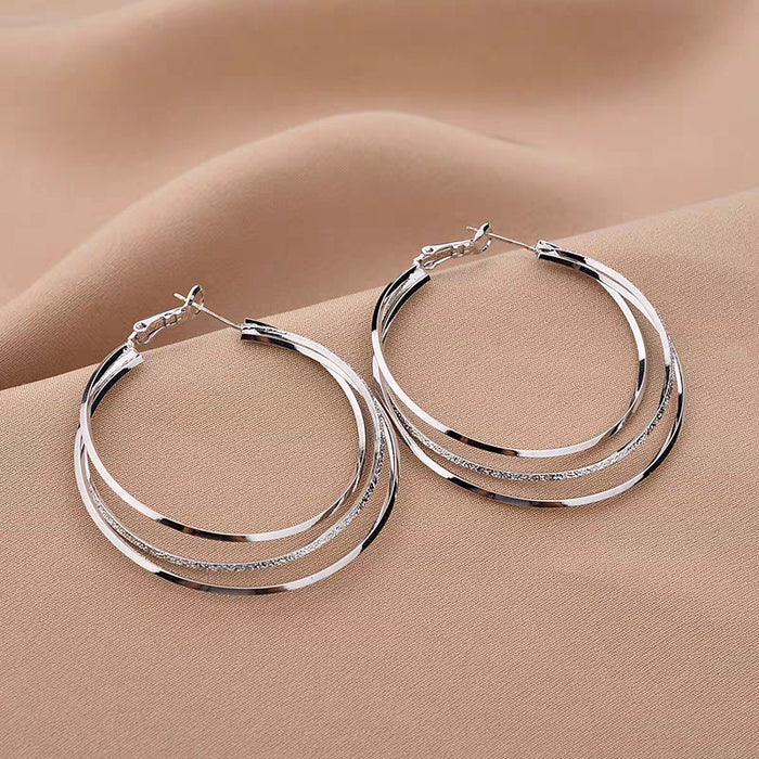 Wholesale Silver needle large ring earrings with multiple layers of large ear rings, exaggerated temperament earrings