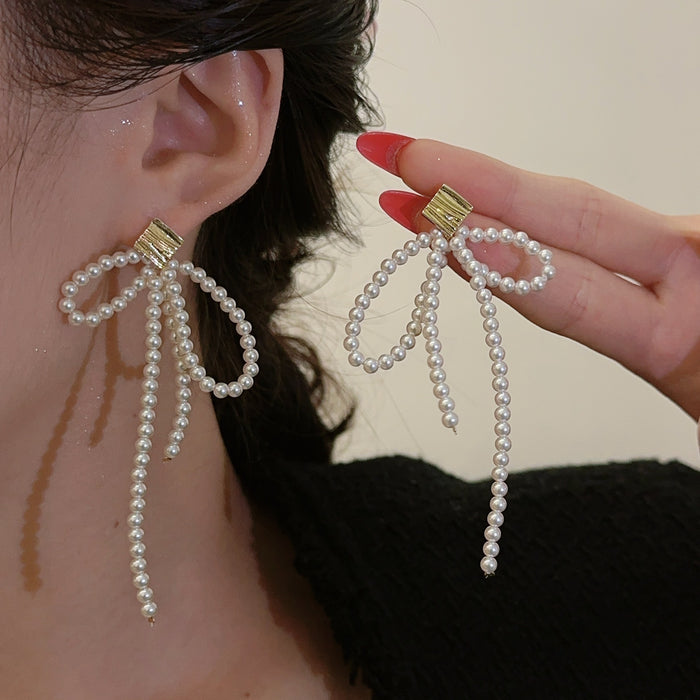 Wholesale Pearl temperament long tassel earrings, niche design, high-end long tassel ear clip