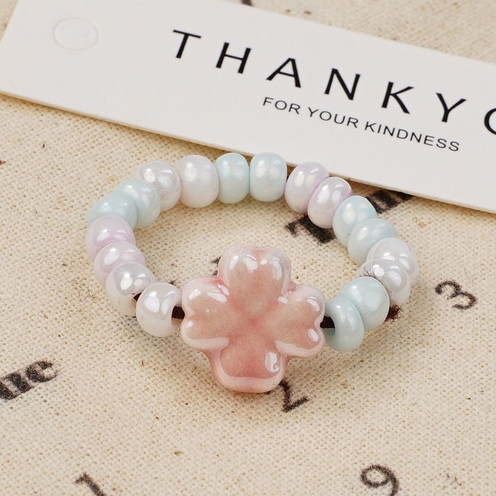 Wholesale New Ceramic Flower Ring Wholesale Student Versatile Handpiece