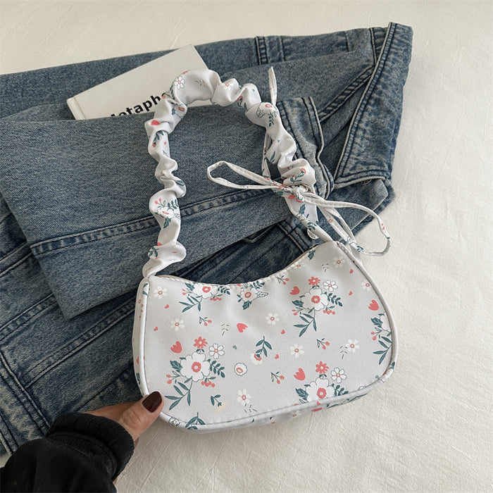 Wholesale Versatile pleated handbag, fashionable flower shoulder bag
