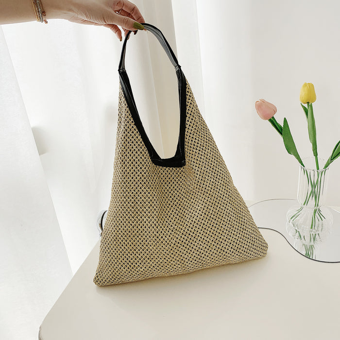Wholesale New straw woven bag, fashionable and simple hollow shoulder bag, vacation and western-style beach bag, grass woven