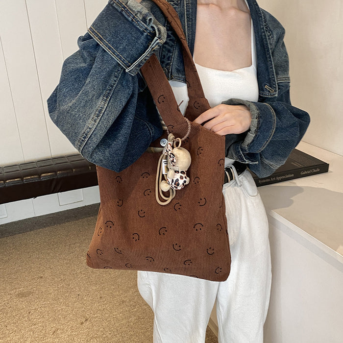 Wholesale New casual and relaxed fashion striped tote bag with large capacity commuting armpit bag