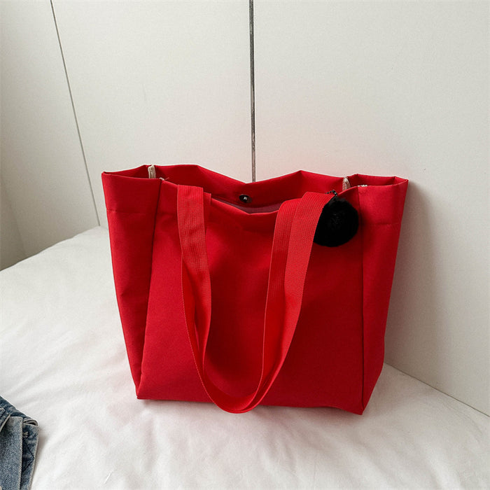 Wholesale Solid color large capacity canvas shoulder bag, simple commuting tote bag, shopping bag