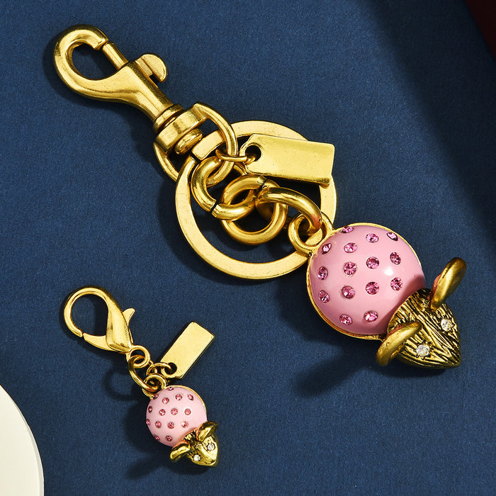 Wholesale Metal keychain with a diamond-encrusted mouse design.