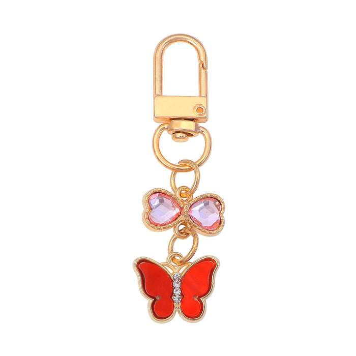 Wholesale Keychain Pendant Creative Alloy Butterfly Headphone Mobile Phone Bag Pendant