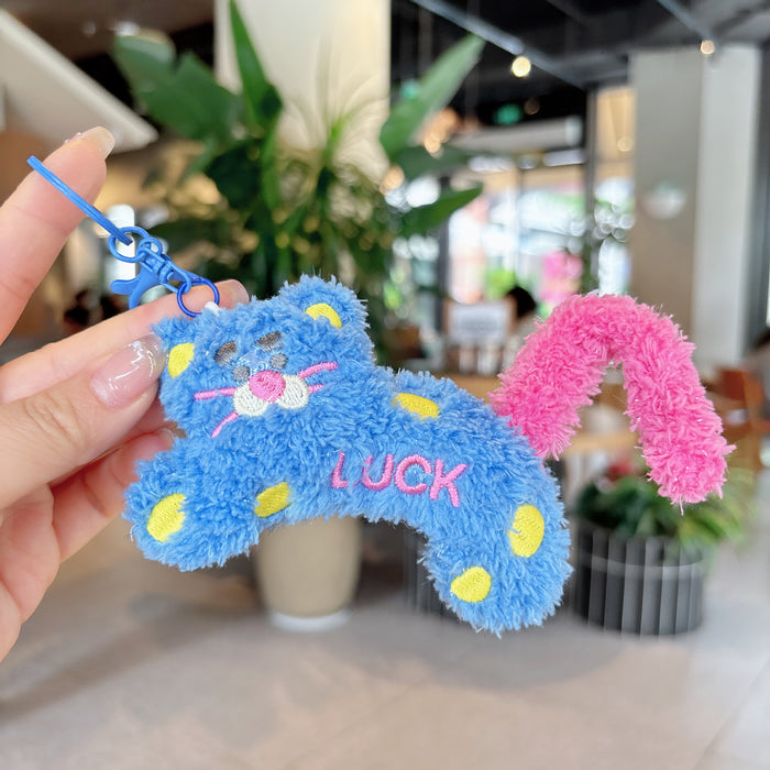 Wholesale Creative cartoon polka dot leopard doll keychain DIY twist tail decompression doll student pendant